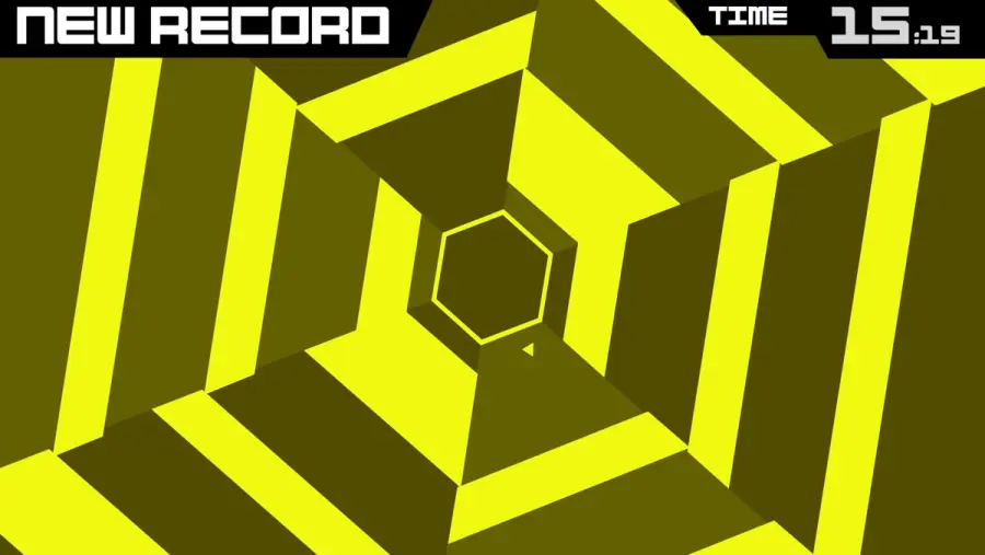 Super Hexagon in play, concentric coloured walls spinning inward toward a small triangle at the centre of the screen.